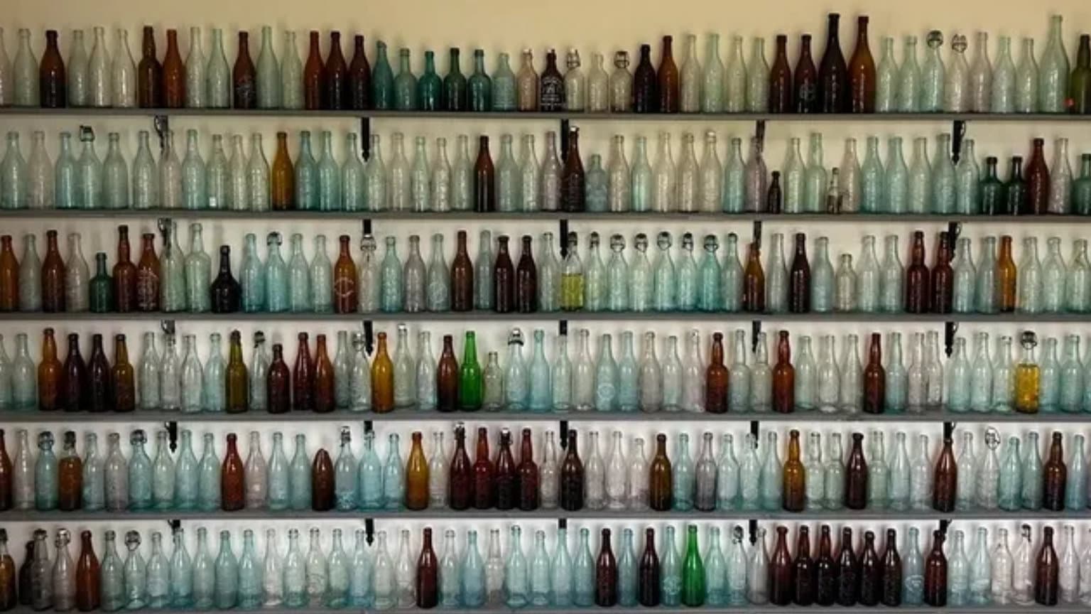 Shelves of antique Baltimore beer bottles